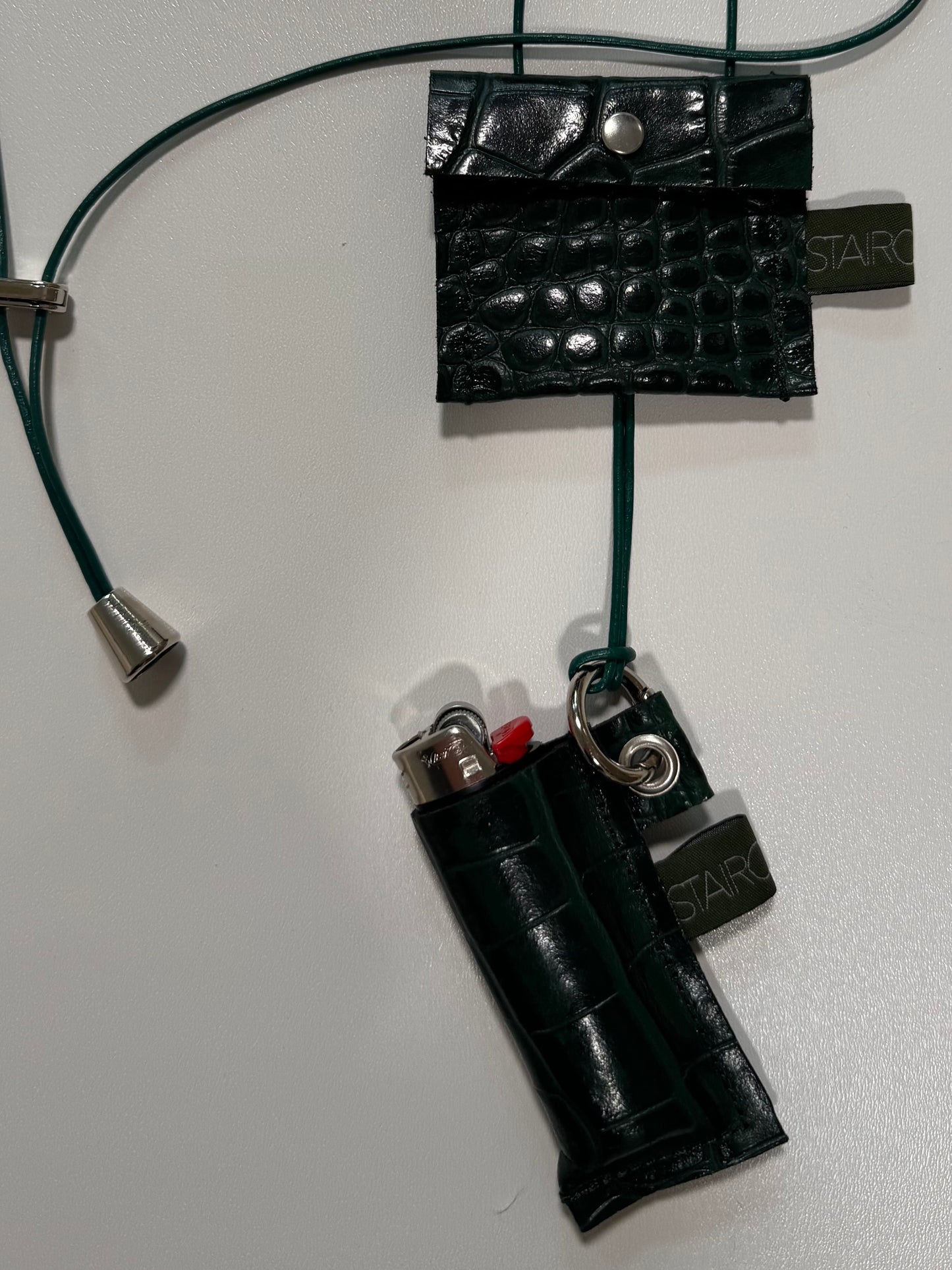 "HIDDEN FLAME" (sling on) with "LIGHTER BAG"