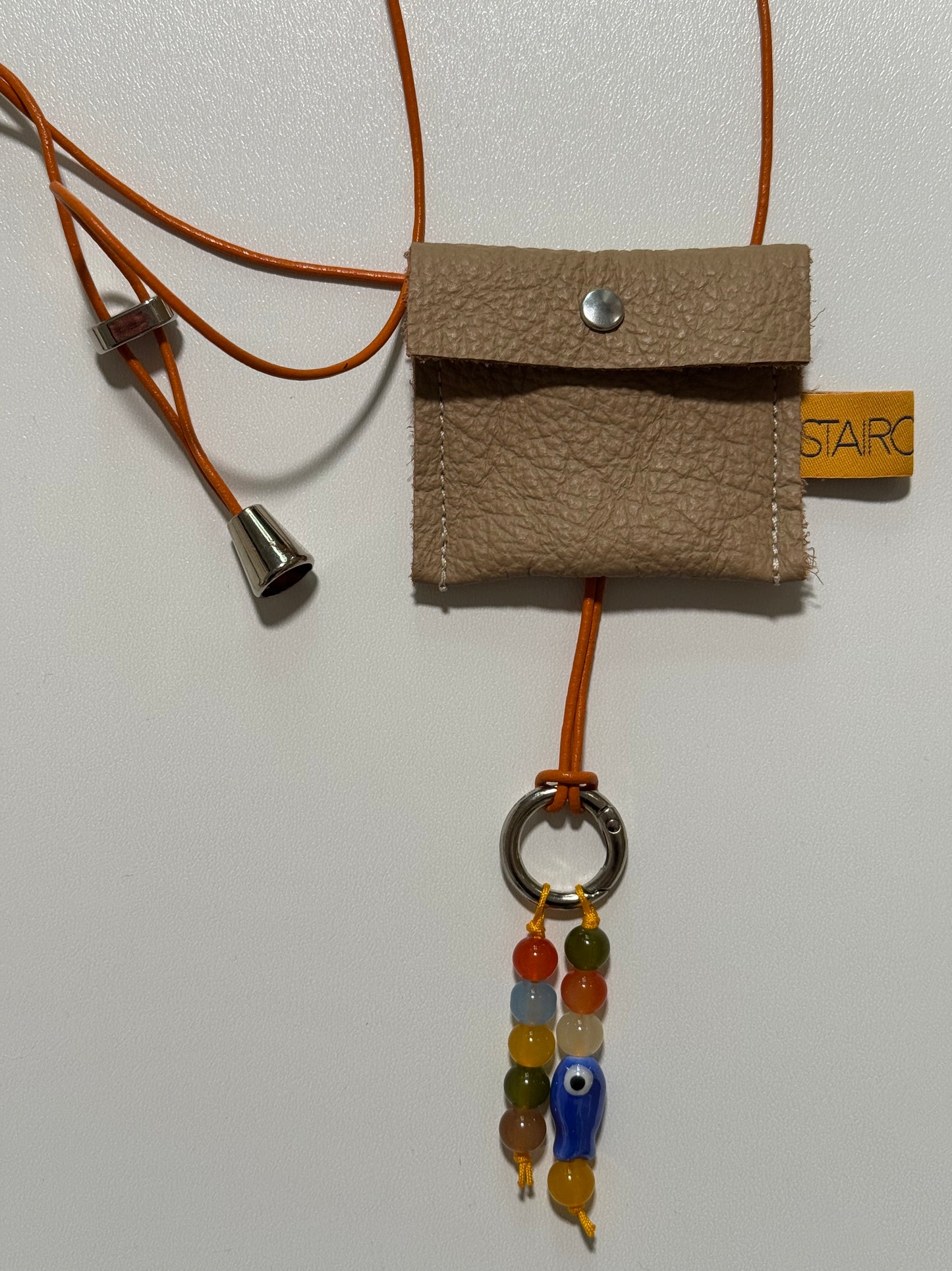 "HIDDEN FLAME" (sling on) with pearl pendant