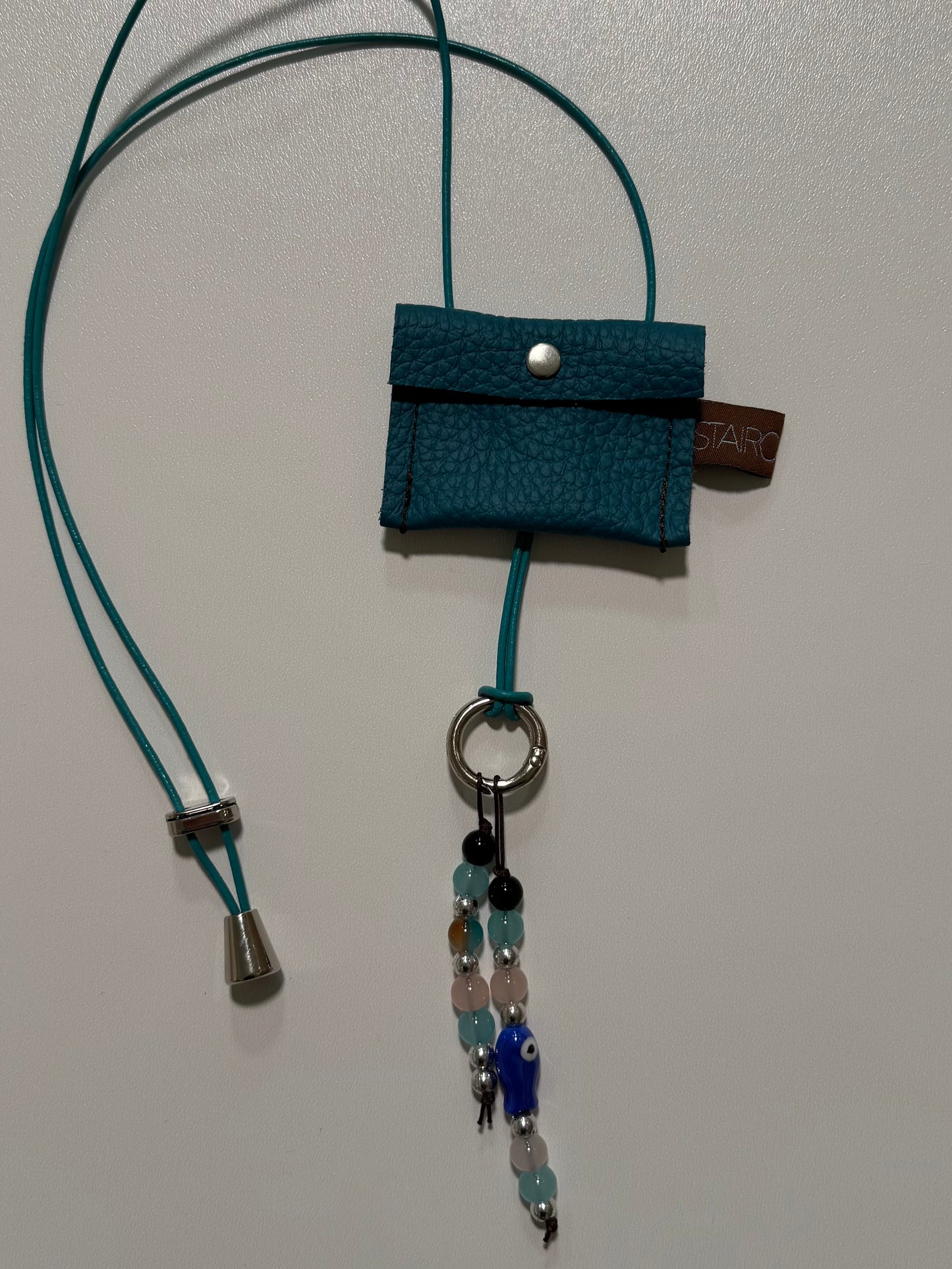 "HIDDEN FLAME" (sling on) with pearl pendant